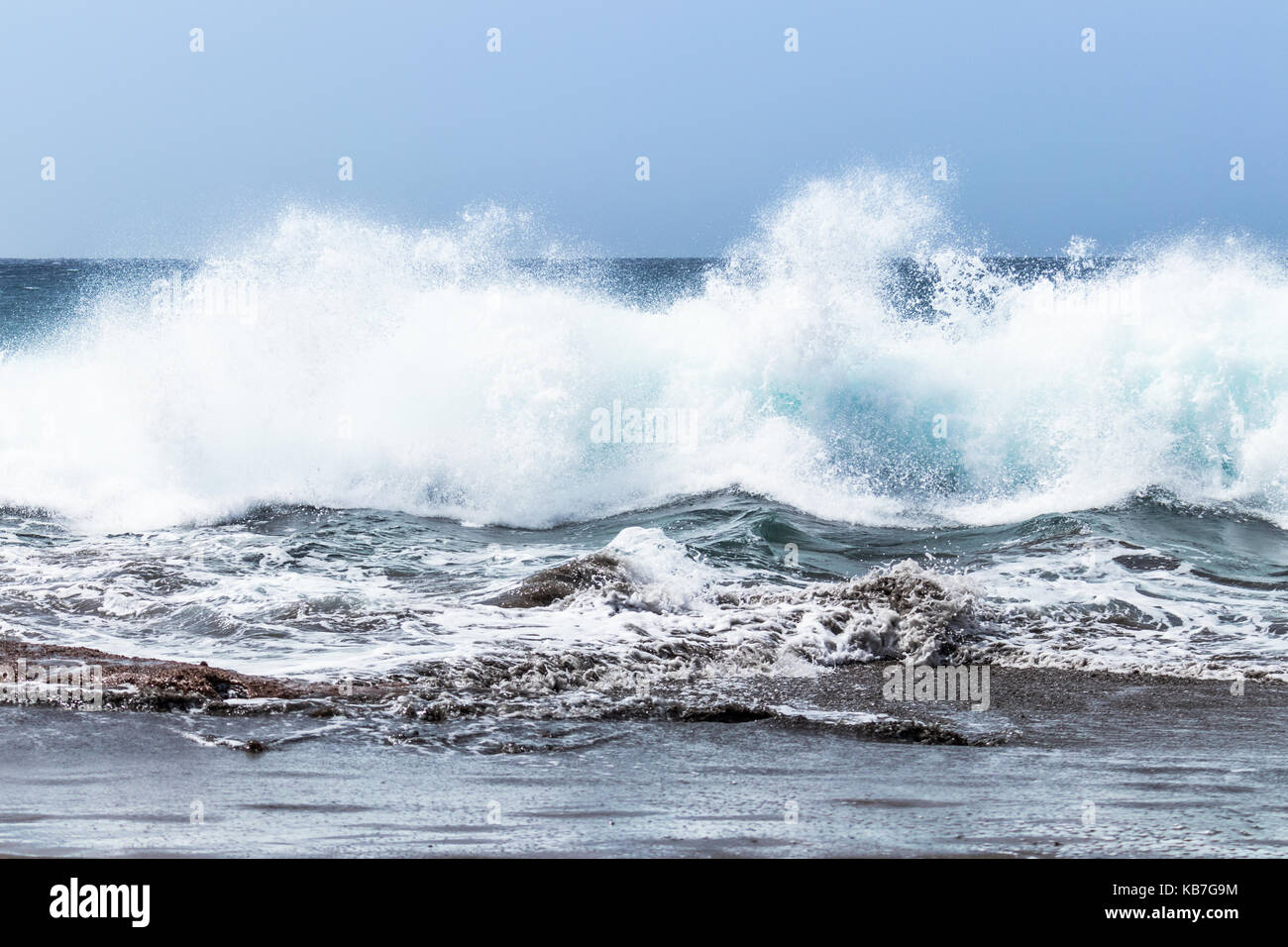 Big crushing waves with white water spray and foam near the cost of El