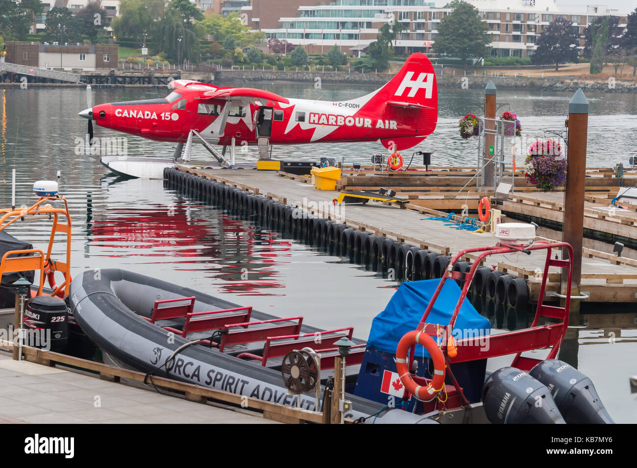 Victoria, British Columbia, Canada - 7 September 2017: Seaplane painted with the Canadian flag docked at Victoria Harbour Airport Stock Photo
