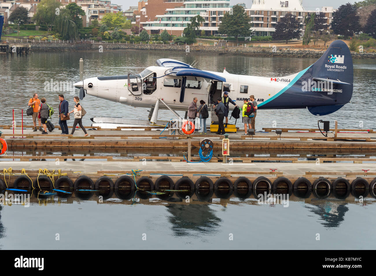 Vancouver, British Columbia, Canada - 7 September 2017: passengers disembarking a 'Harbour Air' Seaplane docked at Victoria Harbour Airport Stock Photo