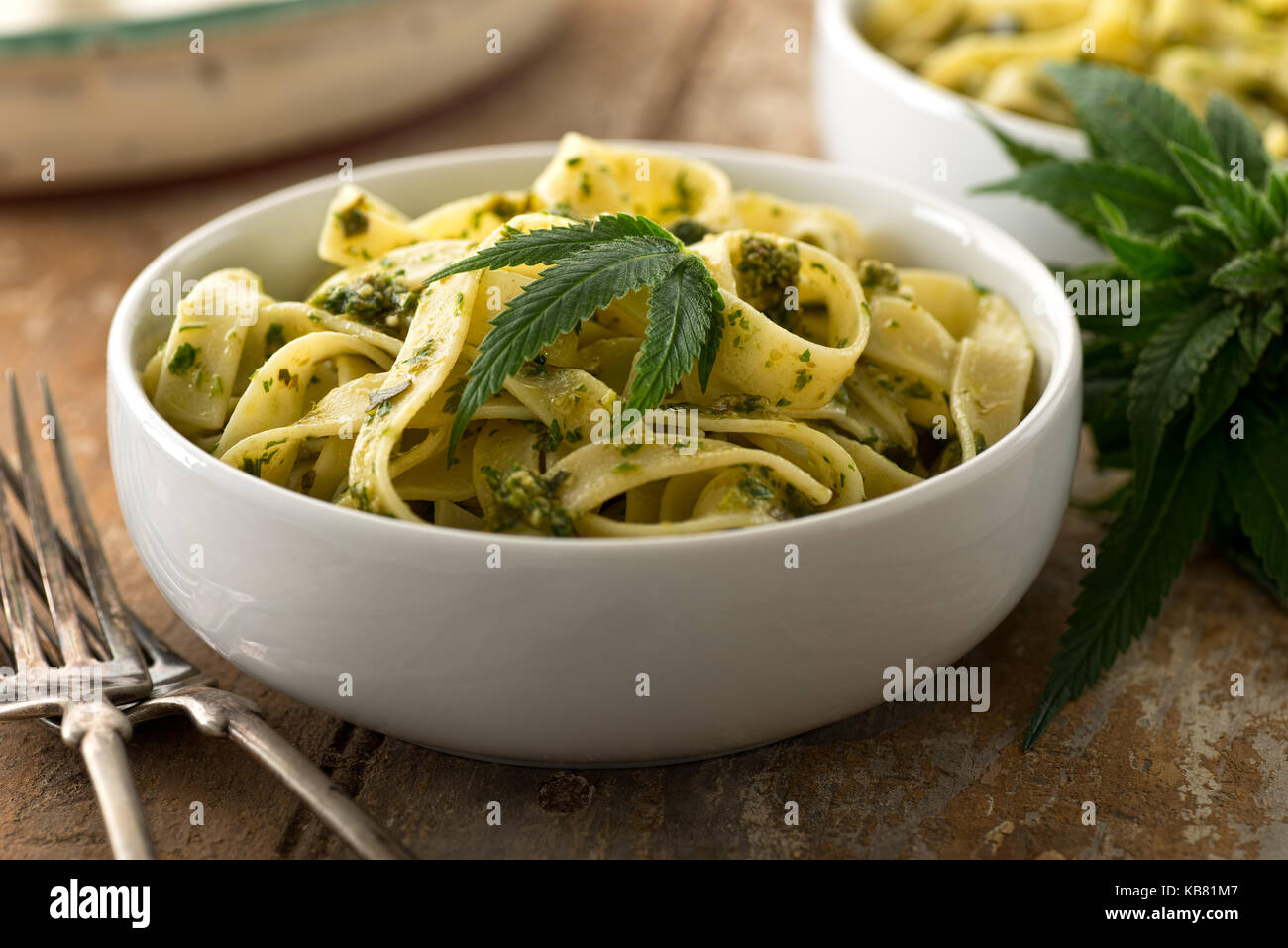 A bowl of delicious pasta with homemade marijuana pesto. Stock Photo