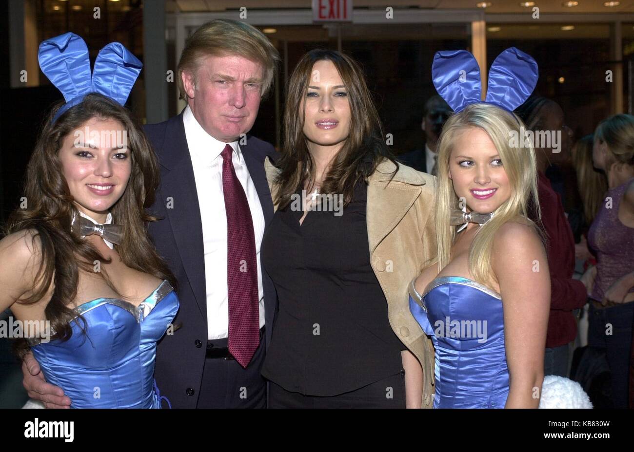 Donald Trump (center left) and Melania Knauss (center right) with