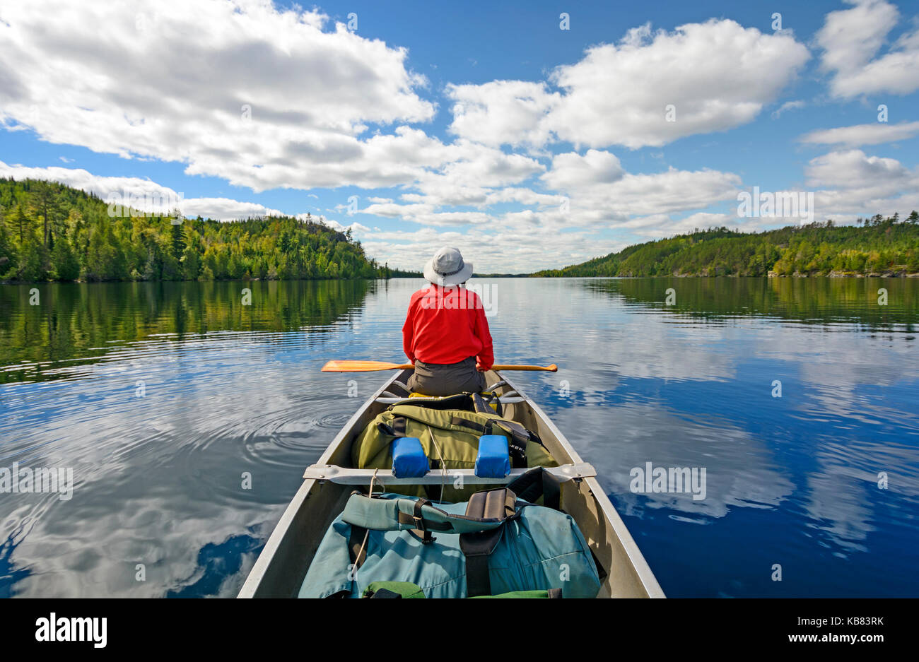 Canoer on Kekekabic Lake in the Boundary Waters in Minnesota Stock Photo