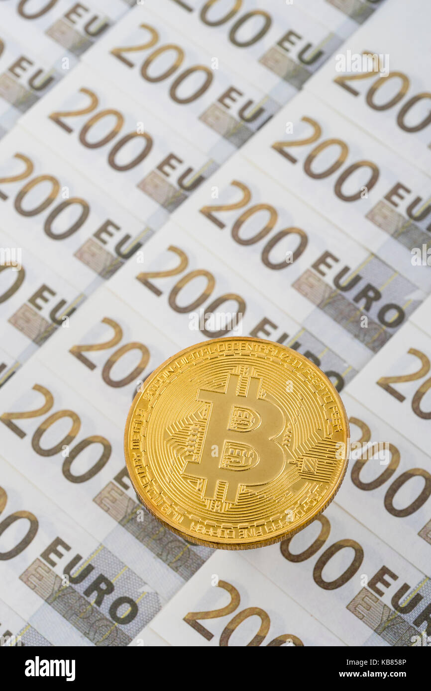 Gold Bitcoin on 200 Euro banknote. For European Digital Single Market, Bitcoin-Euro exchange rate, EU e-commerce, EU Bitcoin regulation, Bitcoin surge Stock Photo
