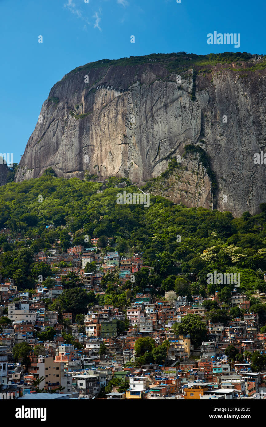 Rocinha favela (Brazil's largest favela), and Morro Dois Irmãos (rock hill), Rio de Janeiro, Brazil, South America Stock Photo