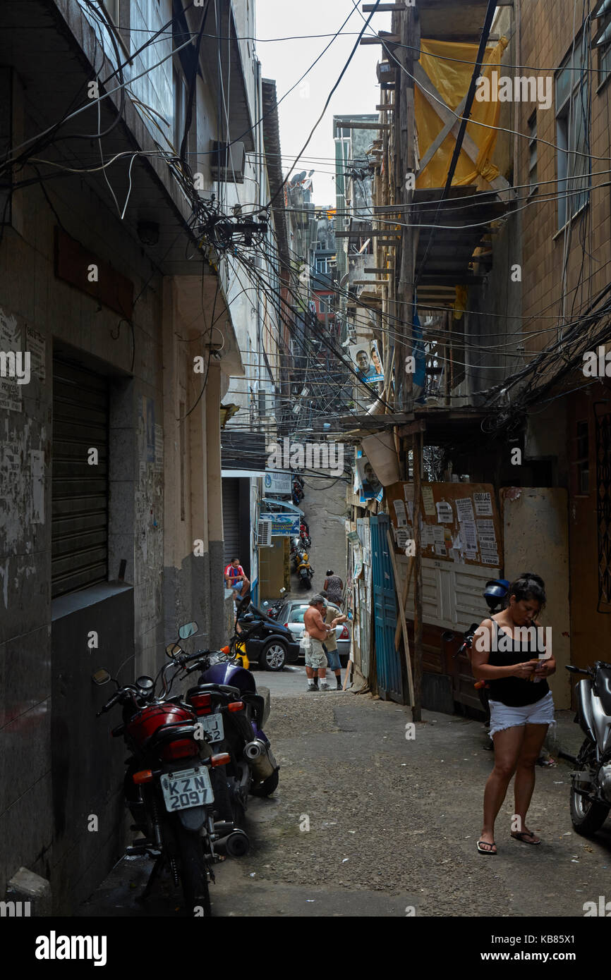 Tangle of wires, and narrow alley, Rocinha favela (Brazil's largest favela), Rio de Janeiro, Brazil, South America Stock Photo