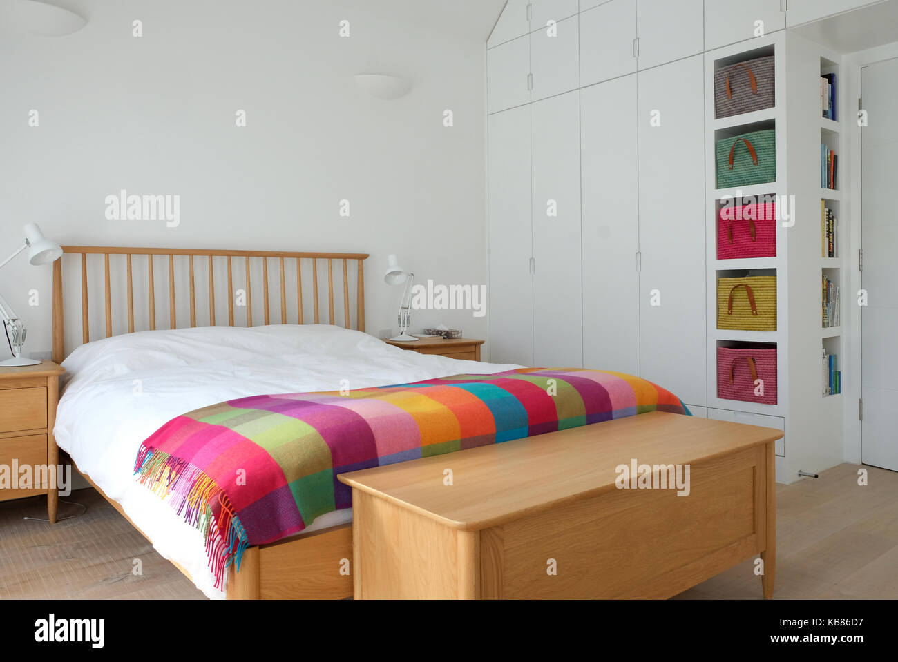 Scandinavian inspired bedroom interior showing wooden bedroom furniture ...