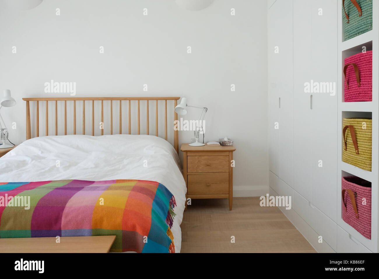 Scandinavian inspired bedroom interior showing wooden bedroom furniture ...