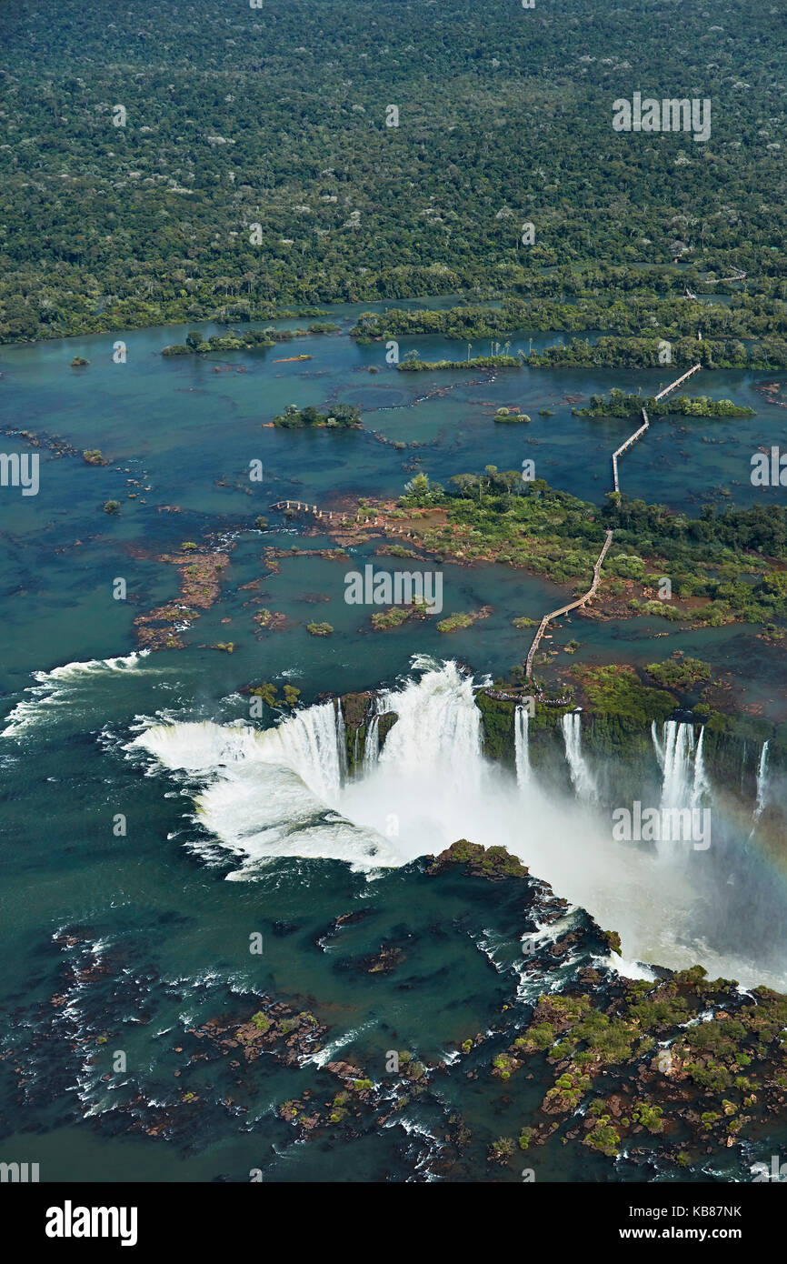 Walkway and Devil's Throat (Garganta do Diabo), Iguazu Falls, on Brazil - Argentina Border, South America - aerial Stock Photo