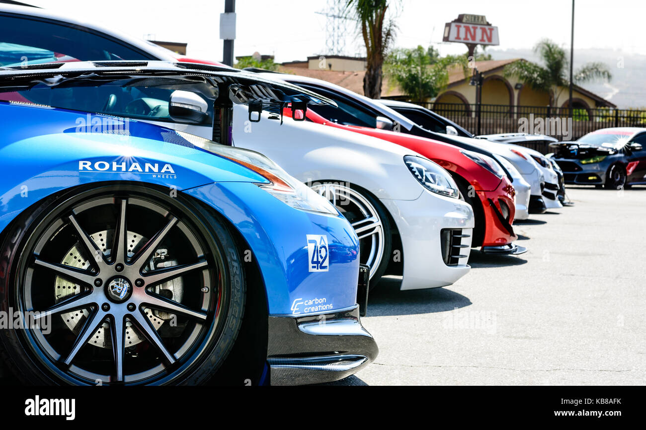 Car front ends all lined up at car meet in South El Monte High School Stock Photo