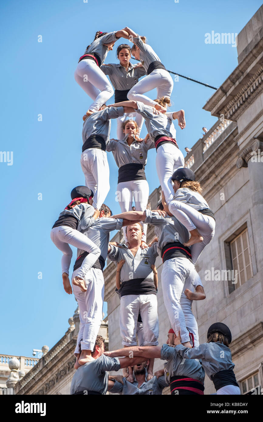 One of Catalonia’s most famous traditions is that of the “castells” (castles), which are human towers that are lifted by building different levels of  Stock Photo
