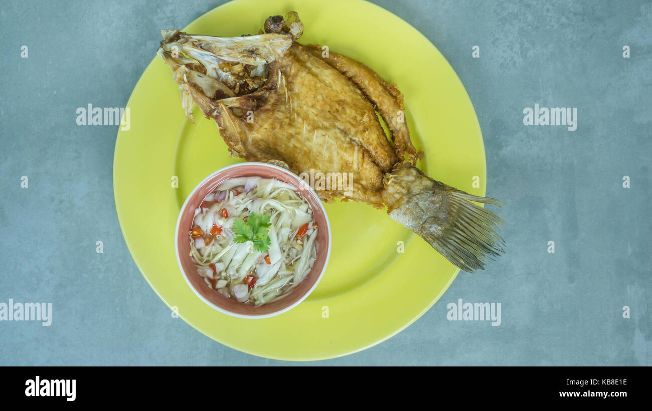 Deep fried fish with green mango salad Stock Photo Alamy