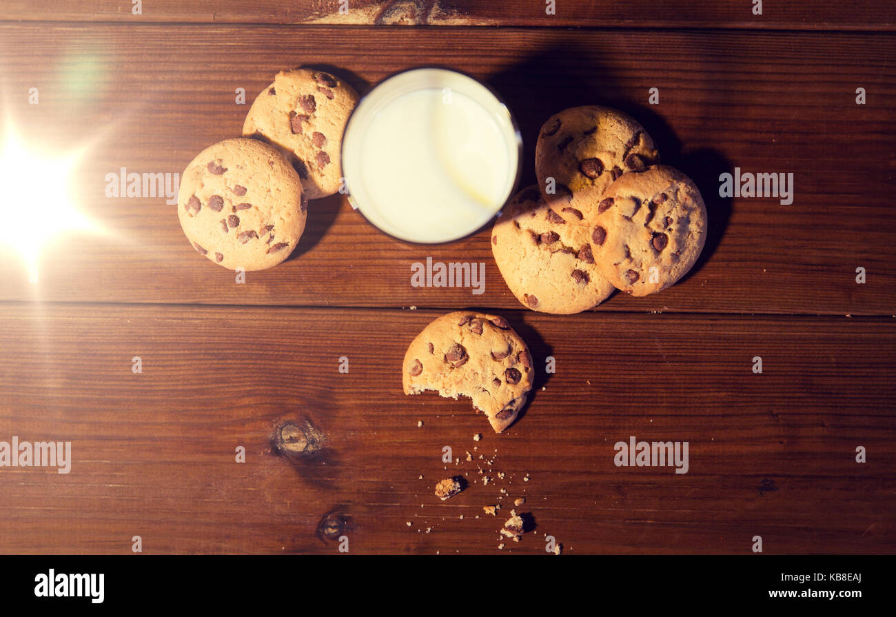 close up of oat cookies and milk on wooden table Stock Photo Alamy