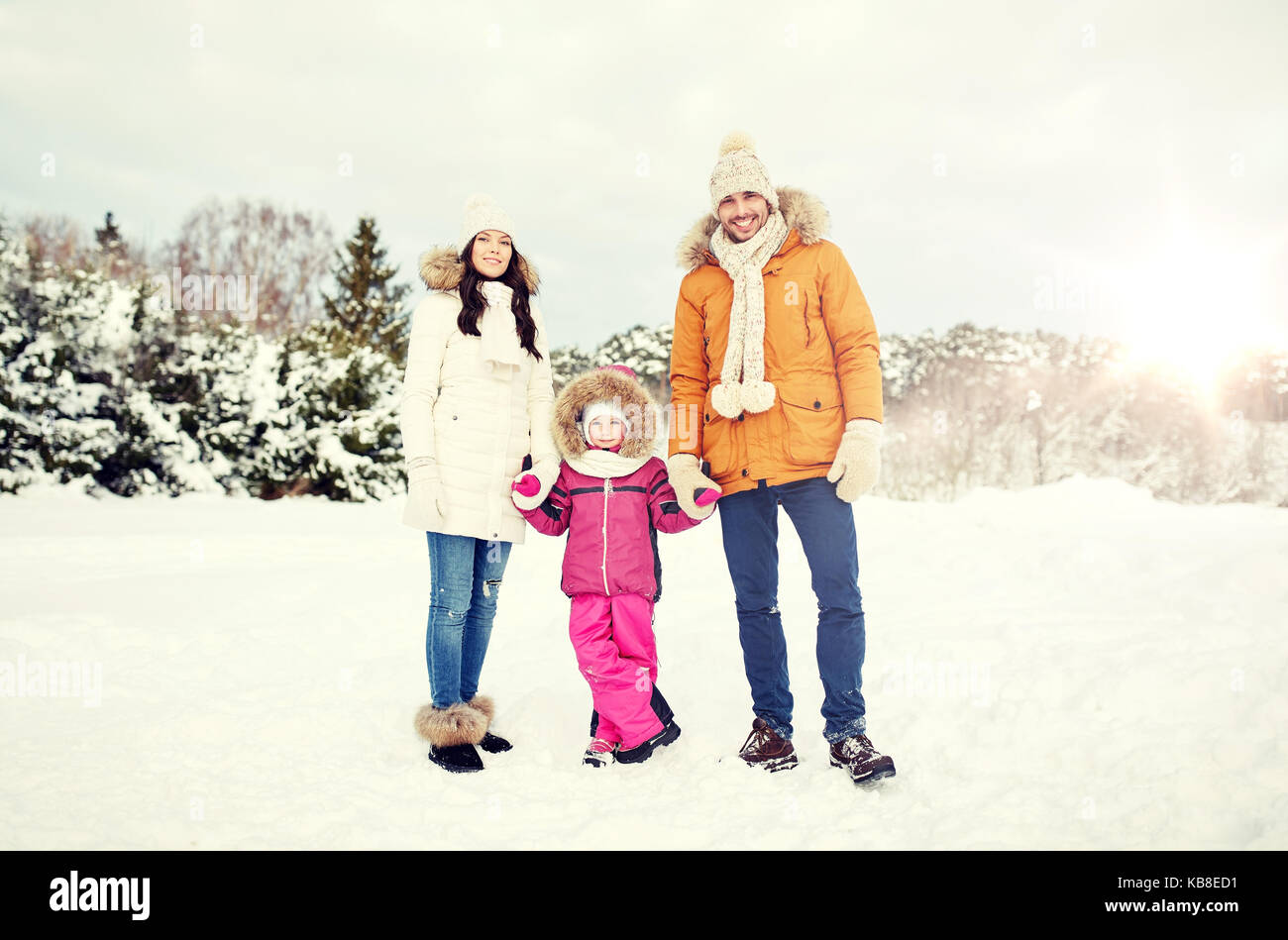 happy family with child in winter clothes outdoors Stock Photo - Alamy