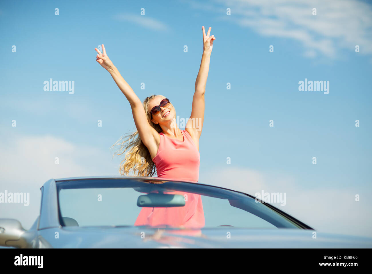 happy young woman in convertible car Stock Photo - Alamy