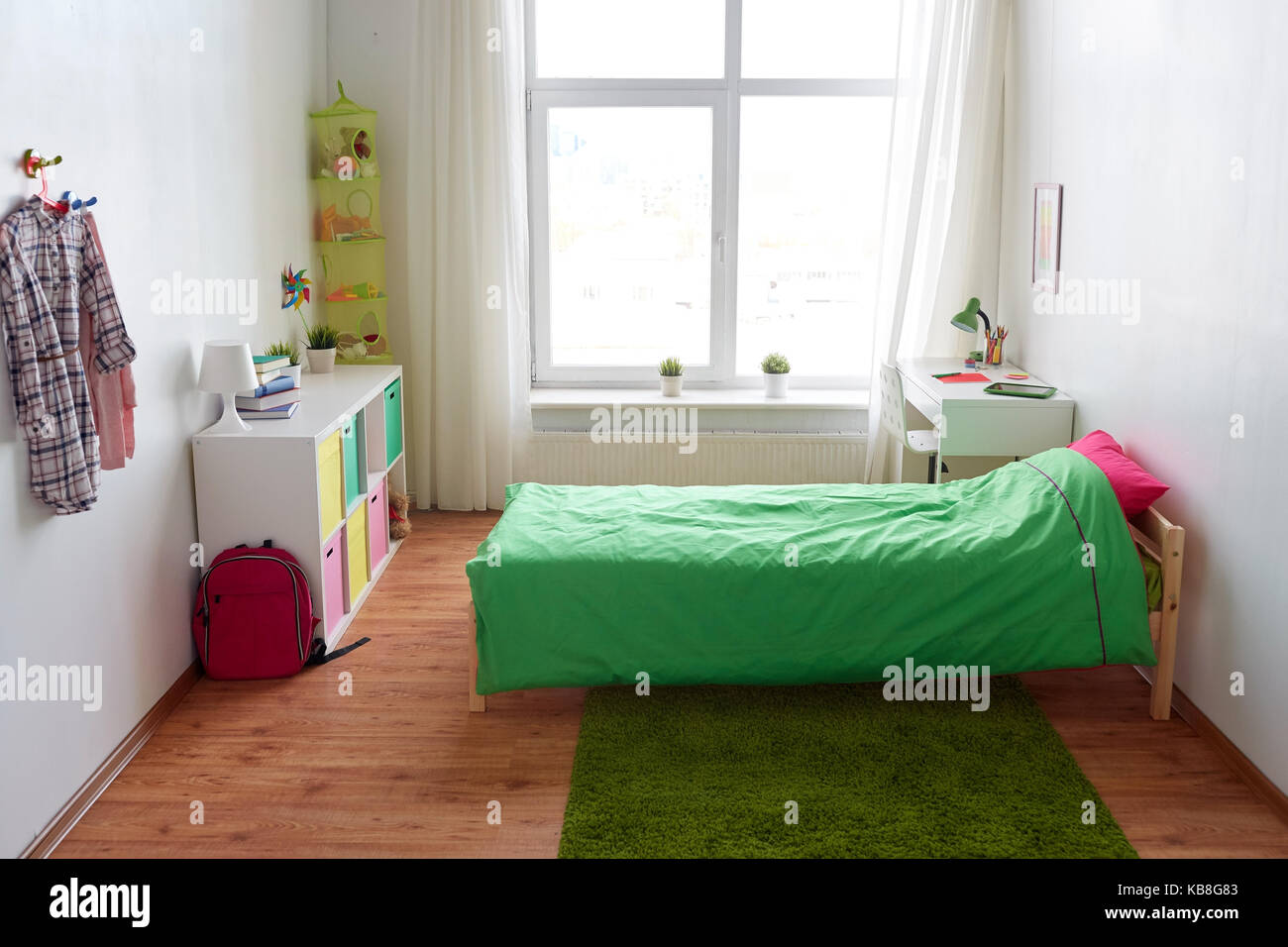 kids room interior with bed, table and accessories Stock Photo