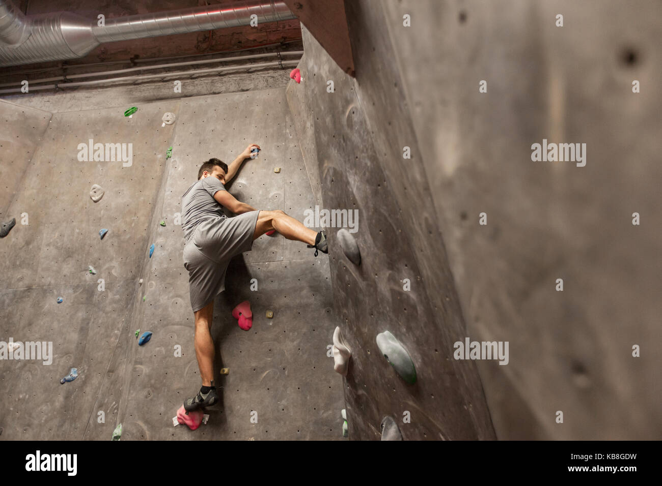 Man indoor rock wall hi-res stock photography and images - Alamy