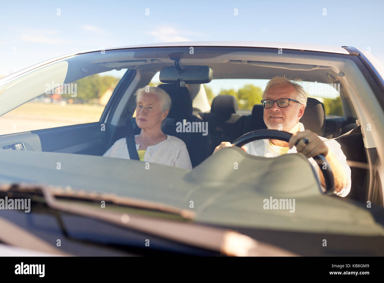 Elderly man driving car hi-res stock photography and images - Alamy