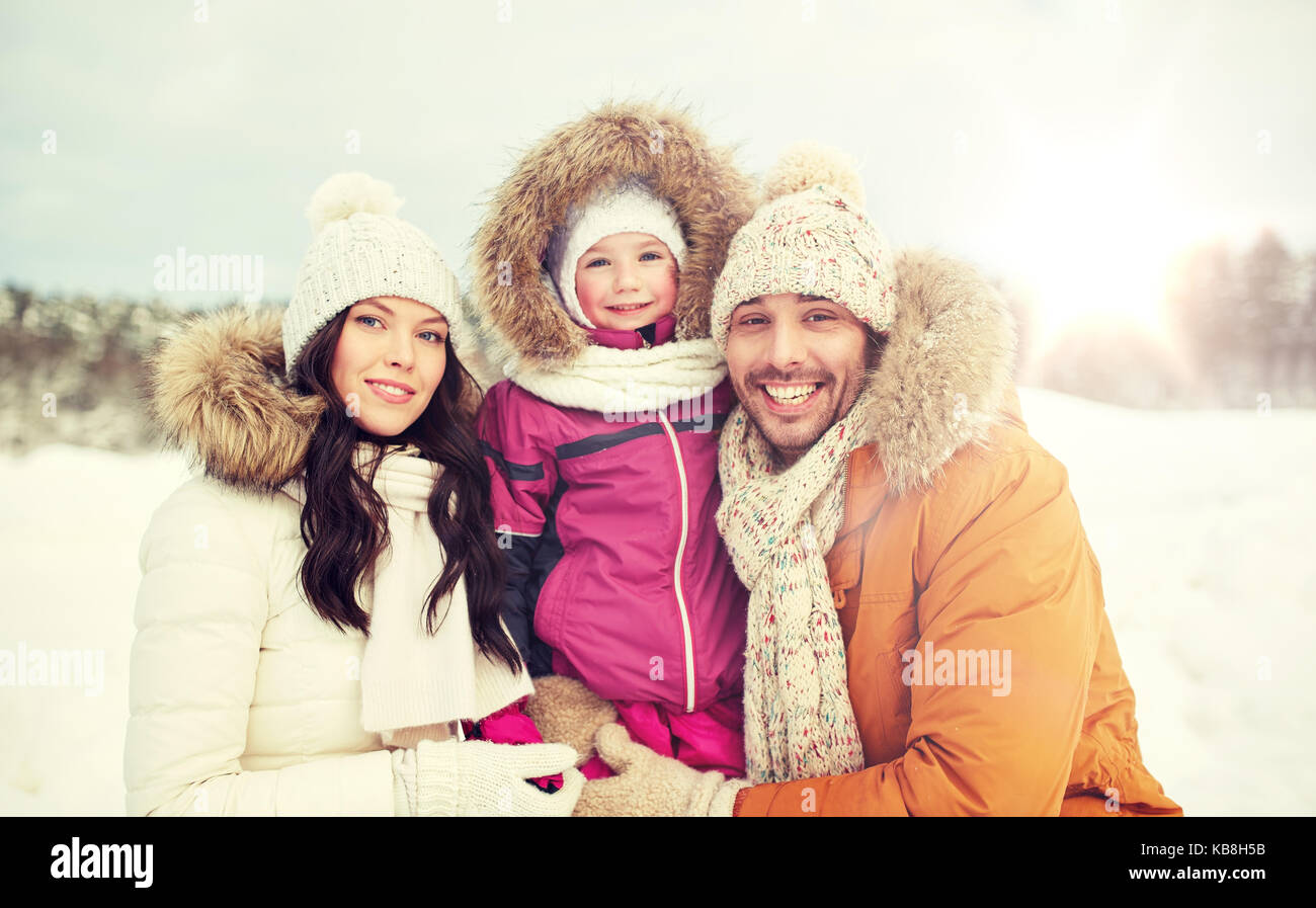 happy family with child in winter clothes outdoors Stock Photo - Alamy