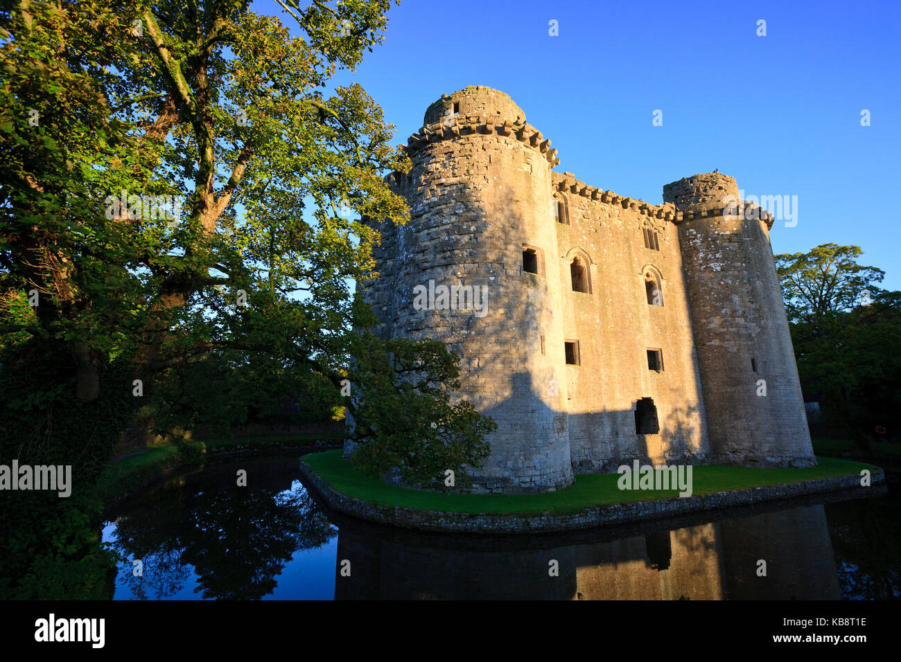 Castle ruins and moat in Nunney, Somerset, UK. Stock Photo
