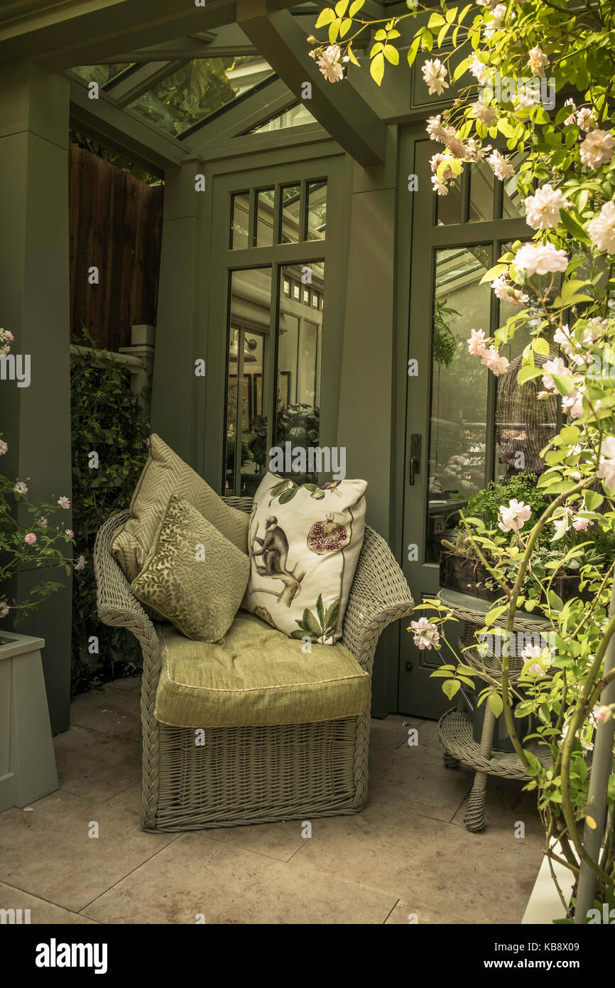 A comfortable seating are in a conservatory at the 2015 Chelsea Flower