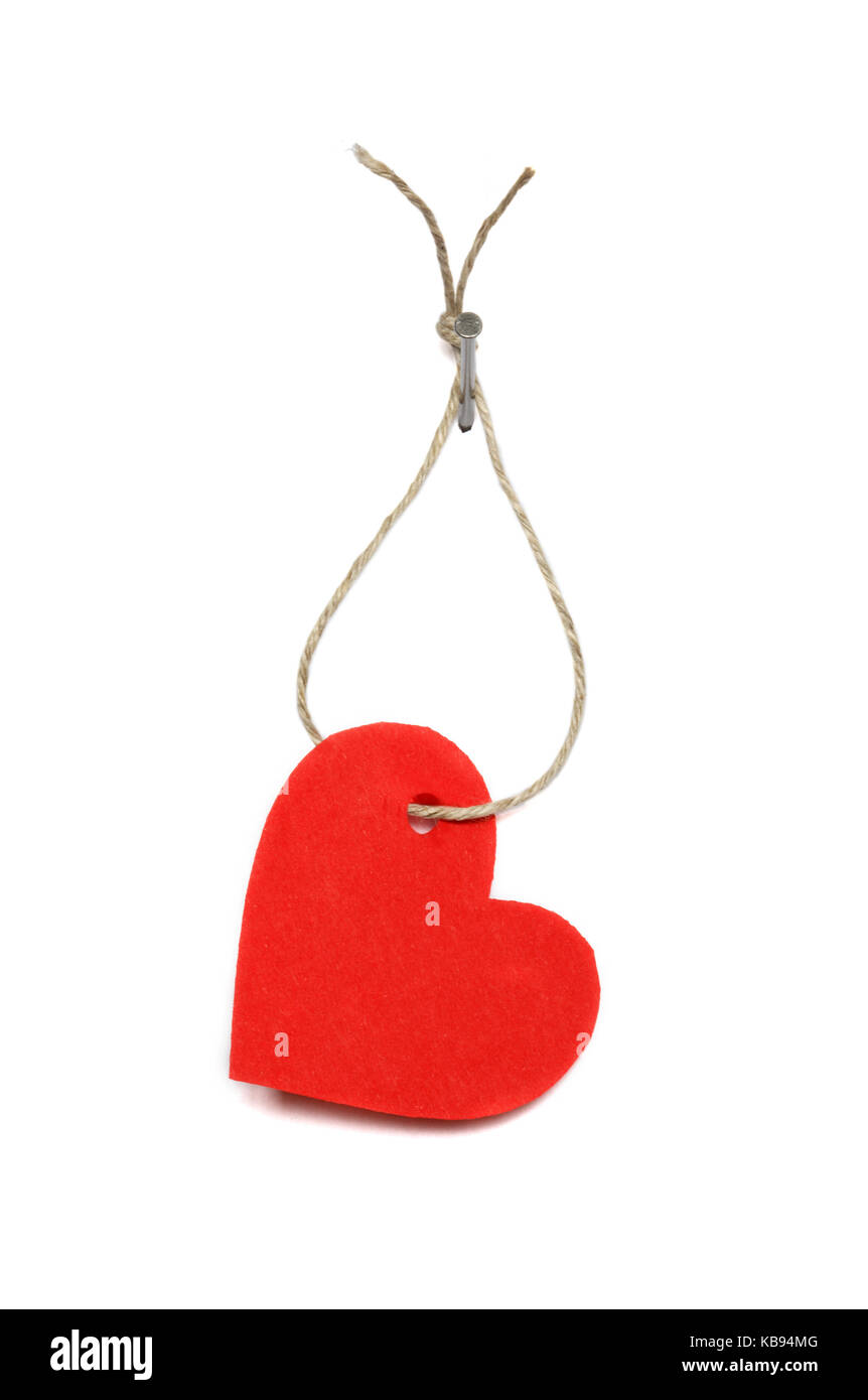 Red paper heart hanging on white background with rope and nail Stock ...