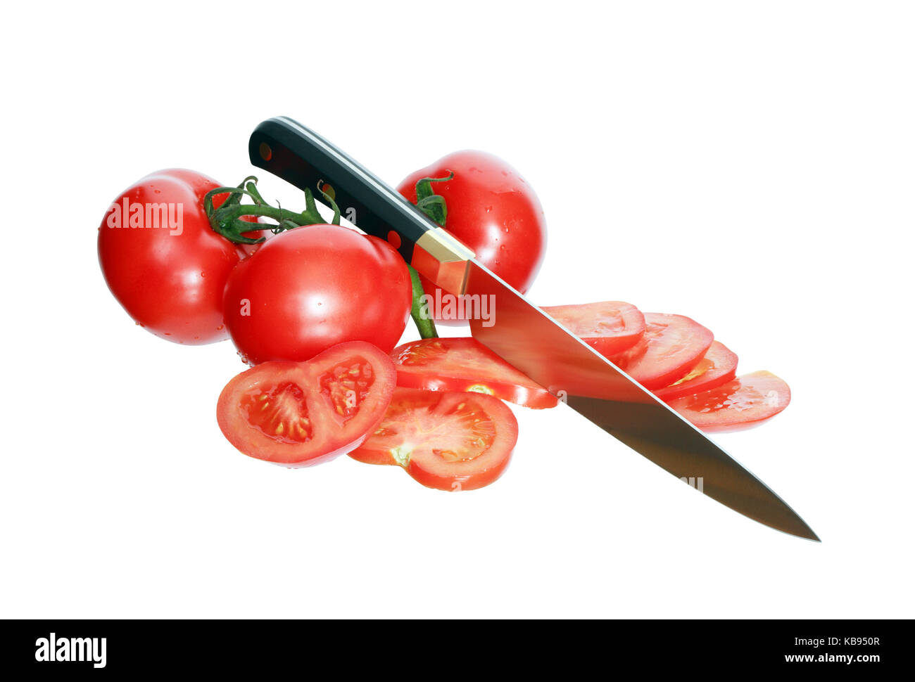Kitchen knife cutting tomato. Isolated on white with clipping path