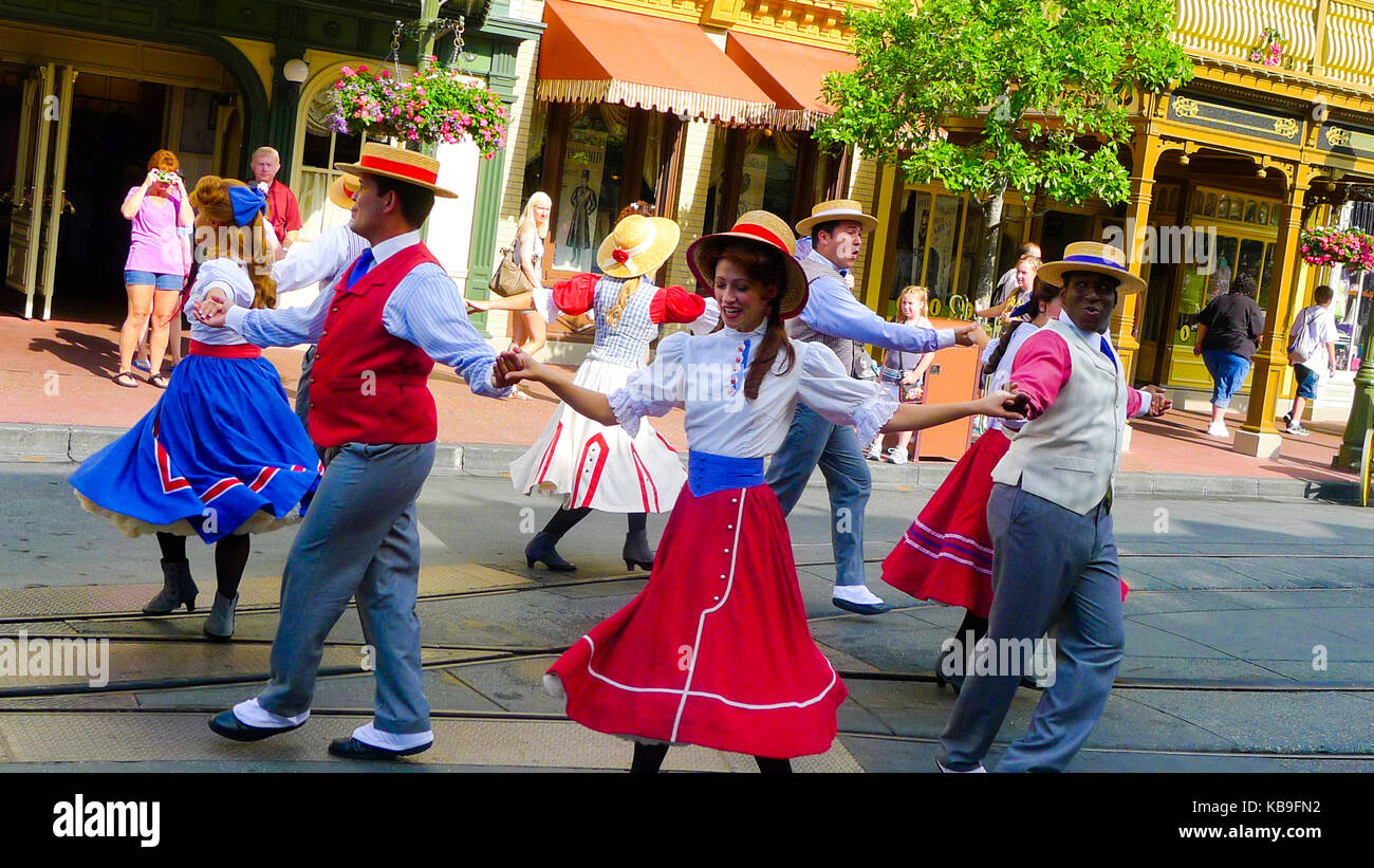 Dancers performing on the main street in Magic Kingdom, Disney World, Orlando, Florida, USA Stock Photo