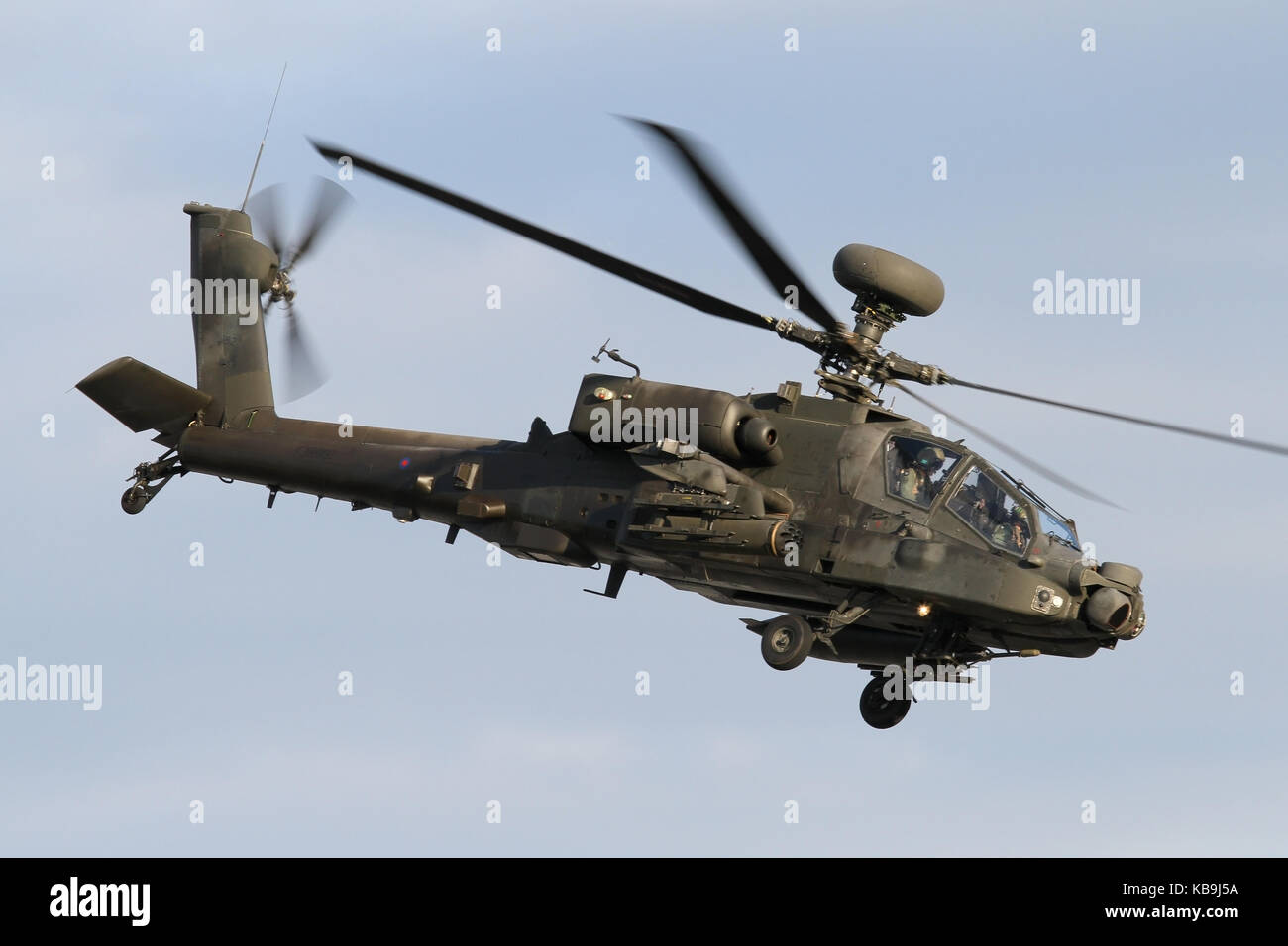 Army Air Corps Apache AH1 in the hover and turning overhead Wattisham Airfield, Suffolk. Wattisham is the types main operating base. Stock Photo