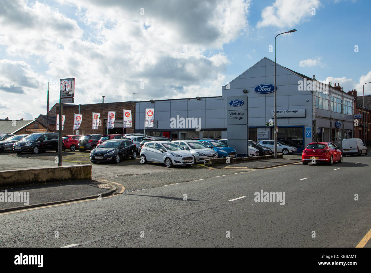 Victoria Garage Car Sales & Service In Leigh, England, UK Stock Photo