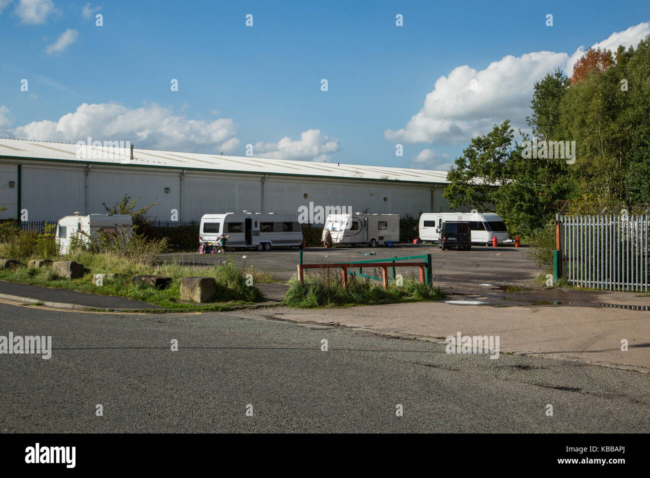 Travellers and caravans on land off Butts Street In Leigh, England, UK Stock Photo