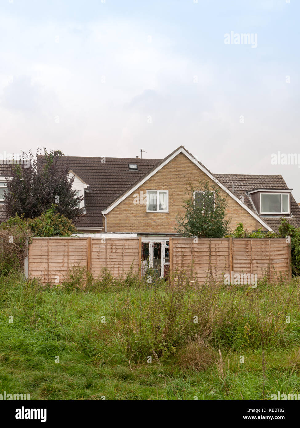 backyard of house with wooden fence outside scene; Essex; England; UK