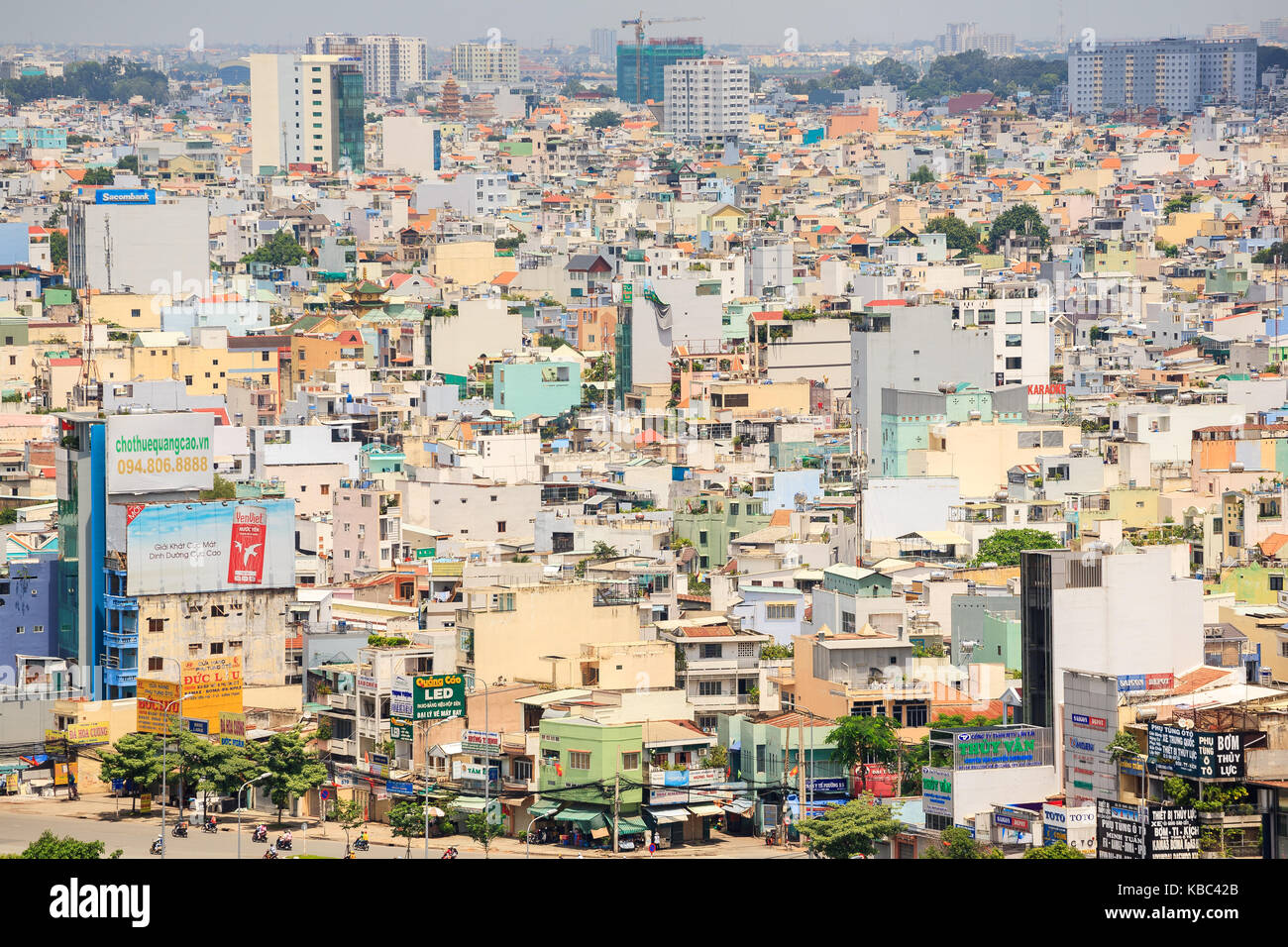 Ho Chi Minh city (or Saigon) skyline with colorful house, Vietnam. Saigon is the biggest city and economic center in Vietnam. Stock Photo