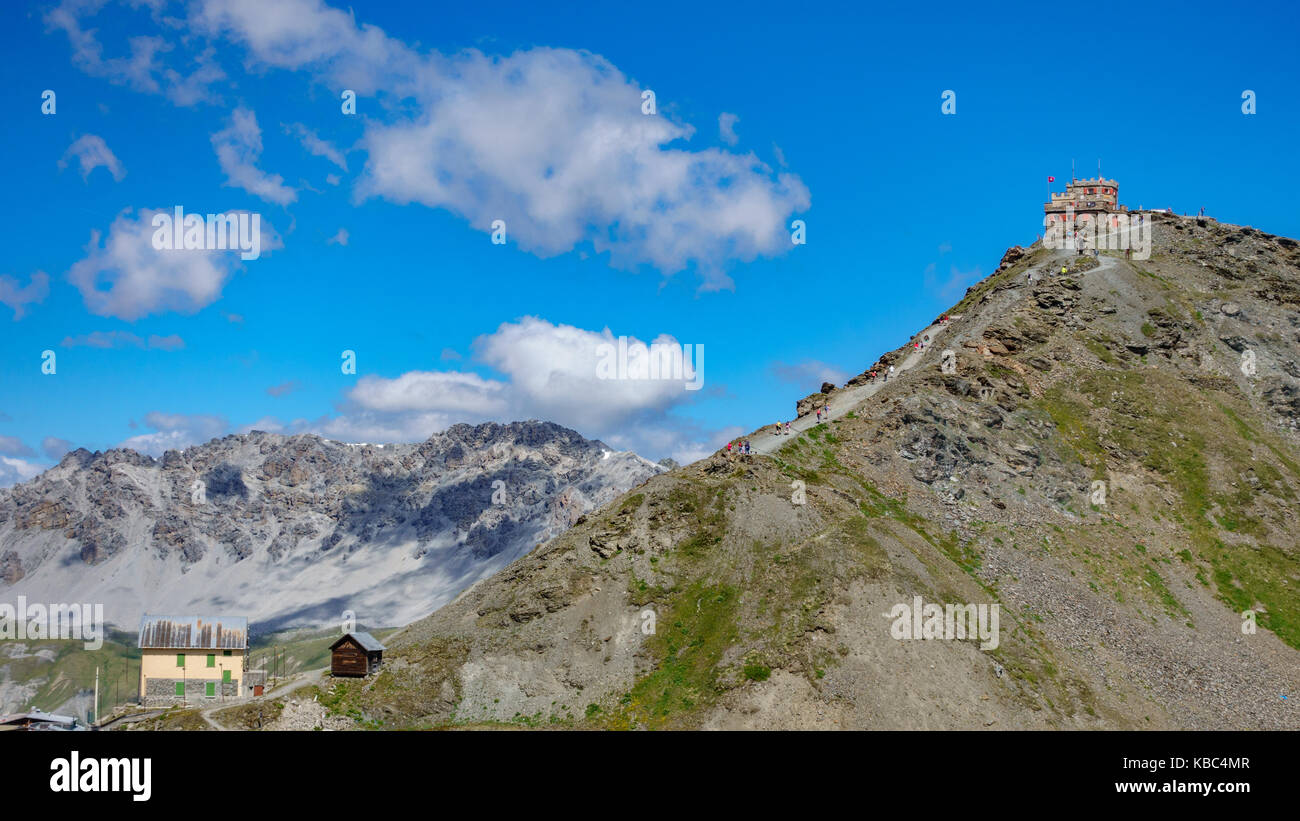 Viewpoint in Stelvio pass with tourists Stock Photo
