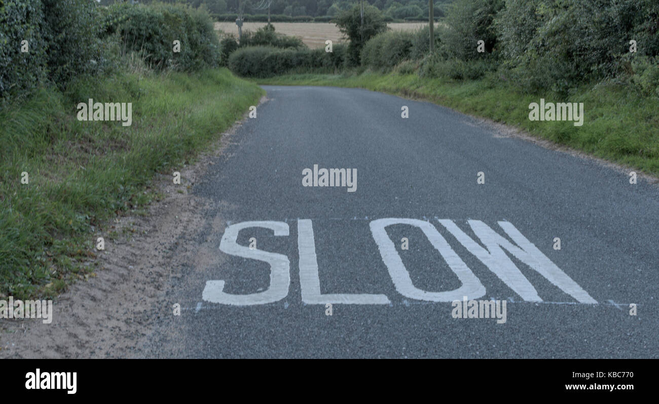 Slow signage at Kettlestone, Norfolk. Stock Photo