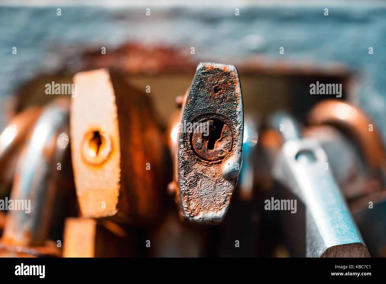 Detailed Close-Up Of Keyhole Of Romantic Lock Of Love On Bridge During Autumn Stock Photo