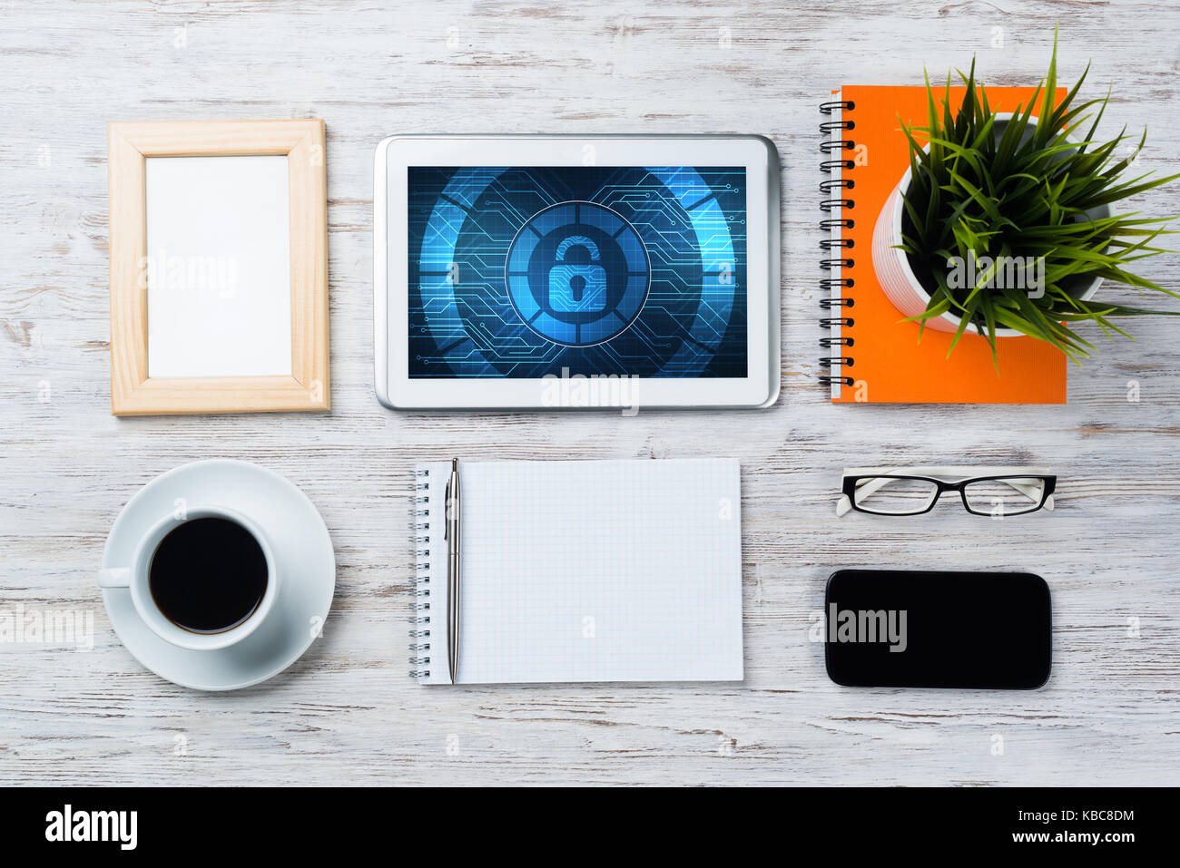 Web security and technology concept with tablet pc on wooden table ...