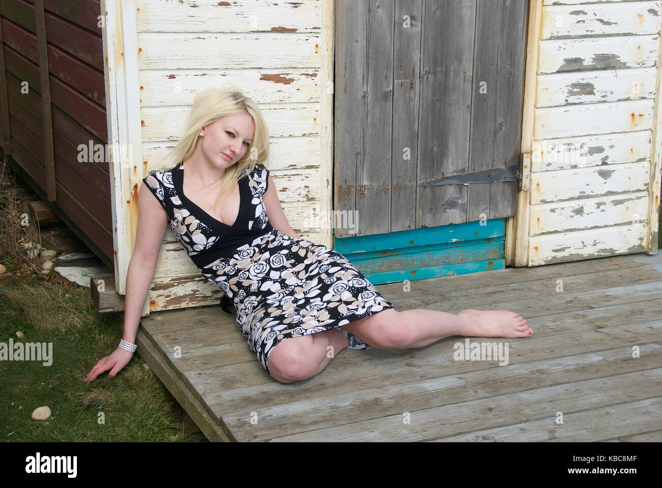 Blonde wearing a dress hi-res stock photography and images - Alamy