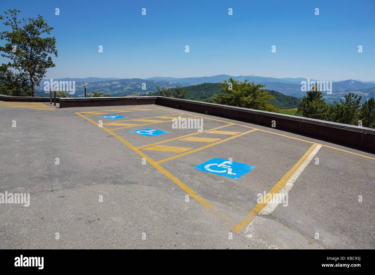 Parking spaces reserved for the disabled in outdoor lot for the public Stock Photo