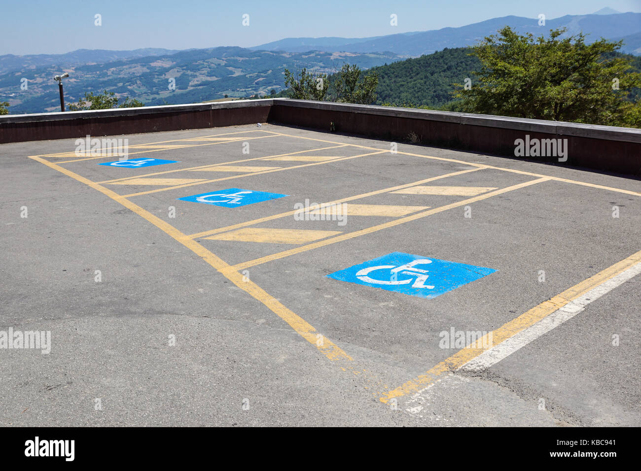 Parking spaces reserved for the disabled in outdoor lot for the public Stock Photo
