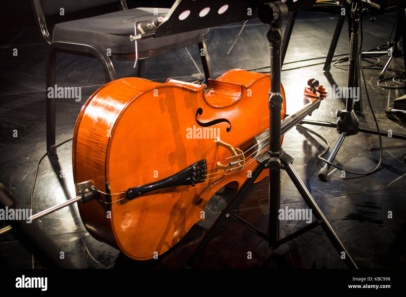 cello music instruments orchestra music on a stage concert hall Stock Photo