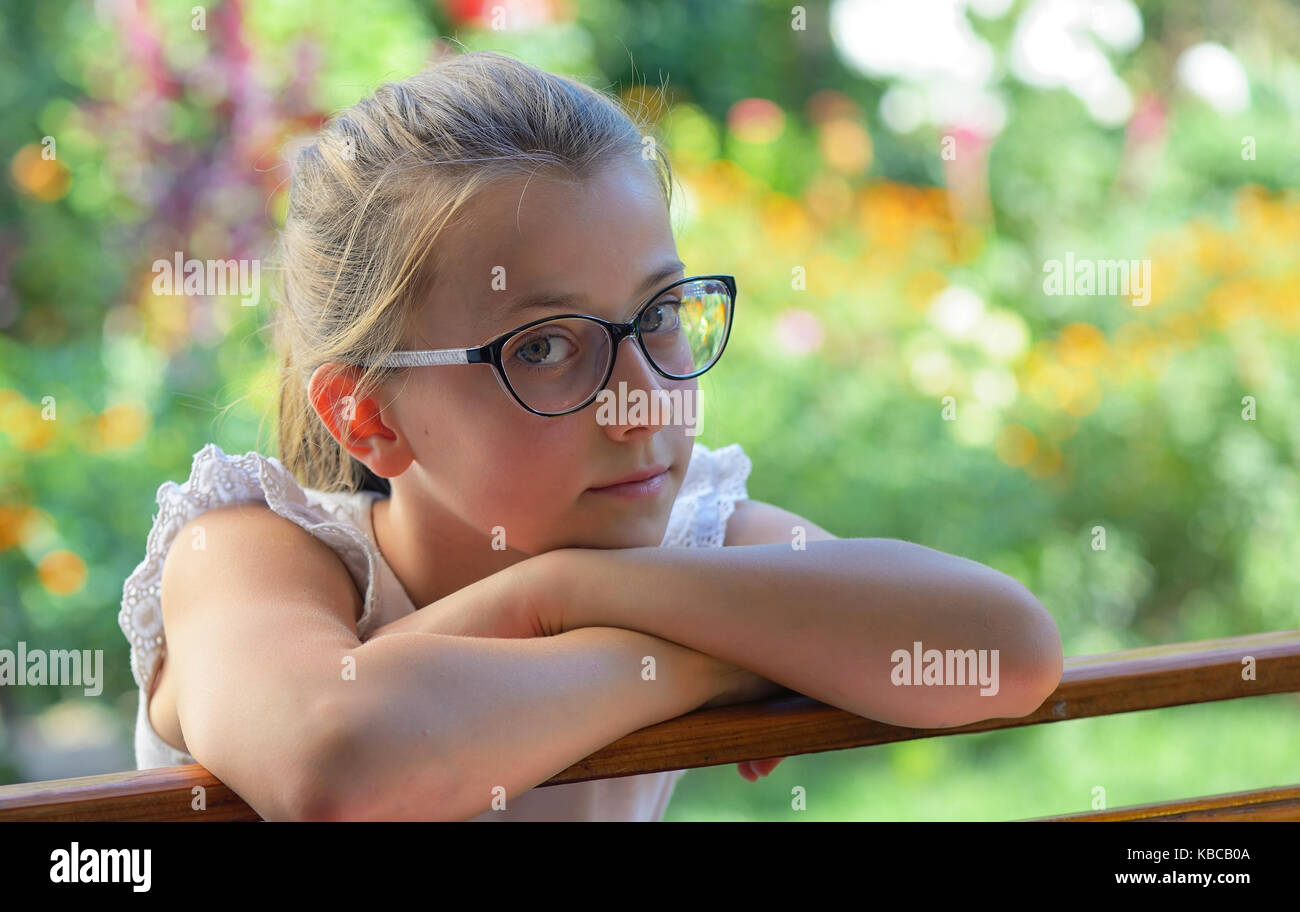 Thoughtful little girl outdoor Stock Photo