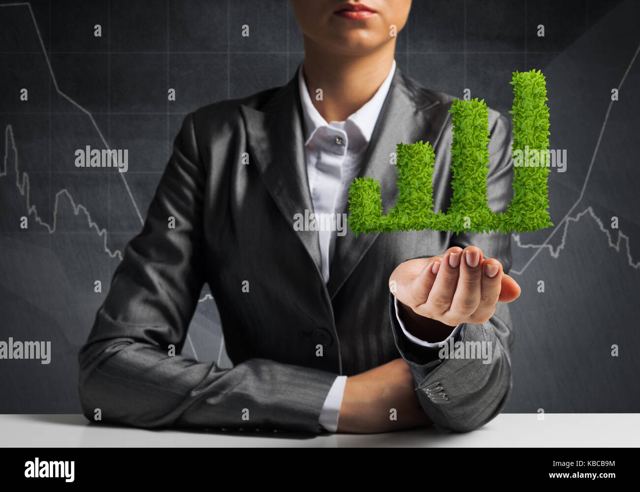 Businessman presenting growing graph Stock Photo - Alamy