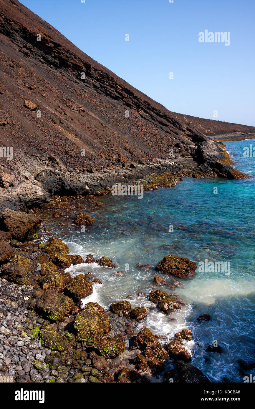 Calhau extinct crater, sharp boulders, basalt ocean shore line. Sao Vicente Island in Cape Verde Stock Photo