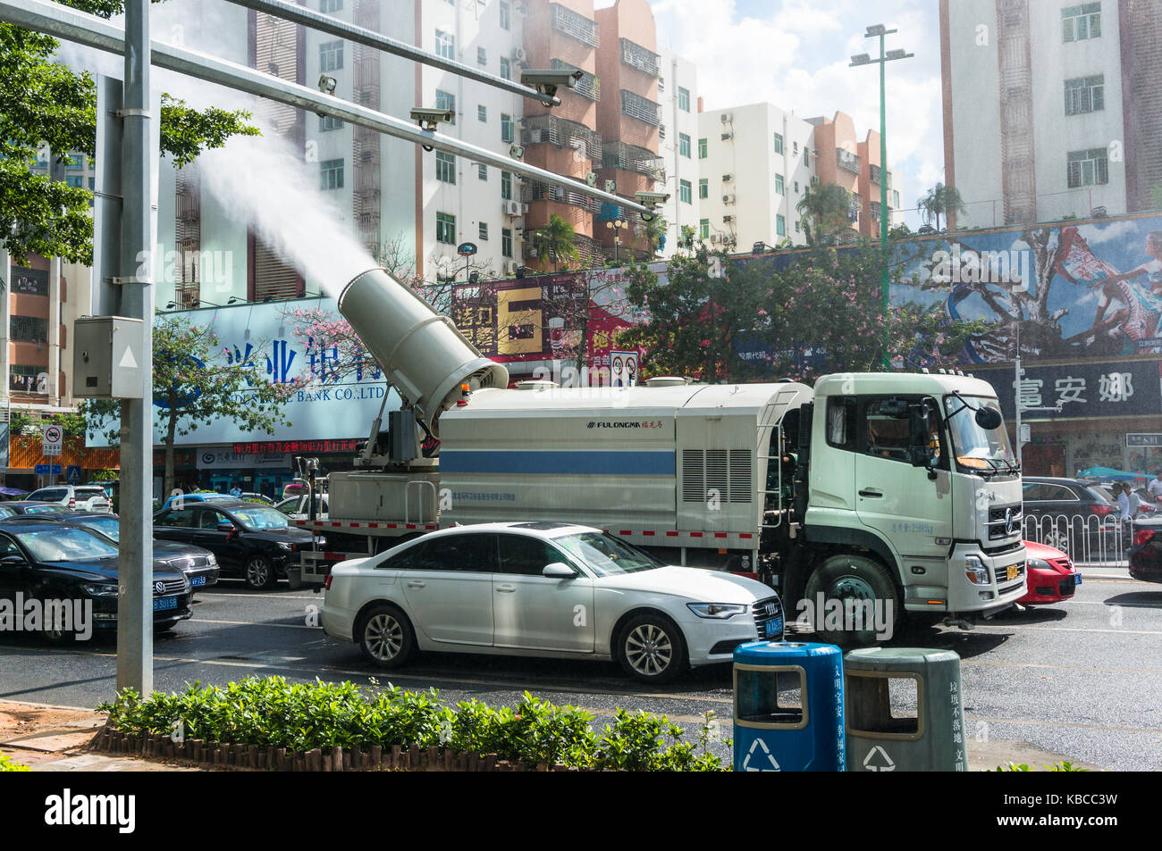 Pollution control misting truck in China with a powerful mist cannon to spray mist for dust and smog control and prevention in Shenzhen, China Stock Photo