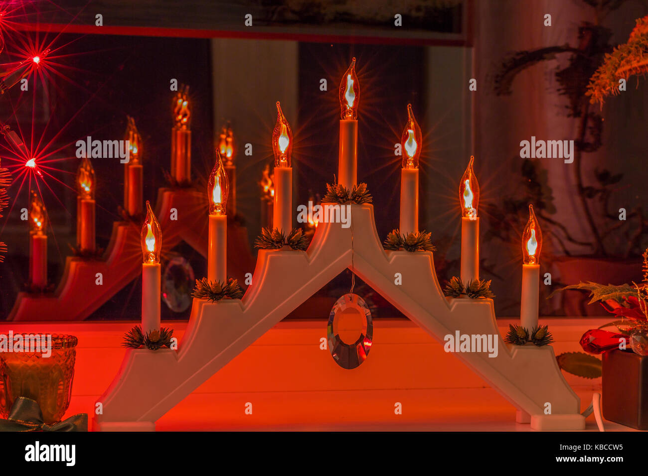 Advent electric candles on window sill Stock Photo Alamy