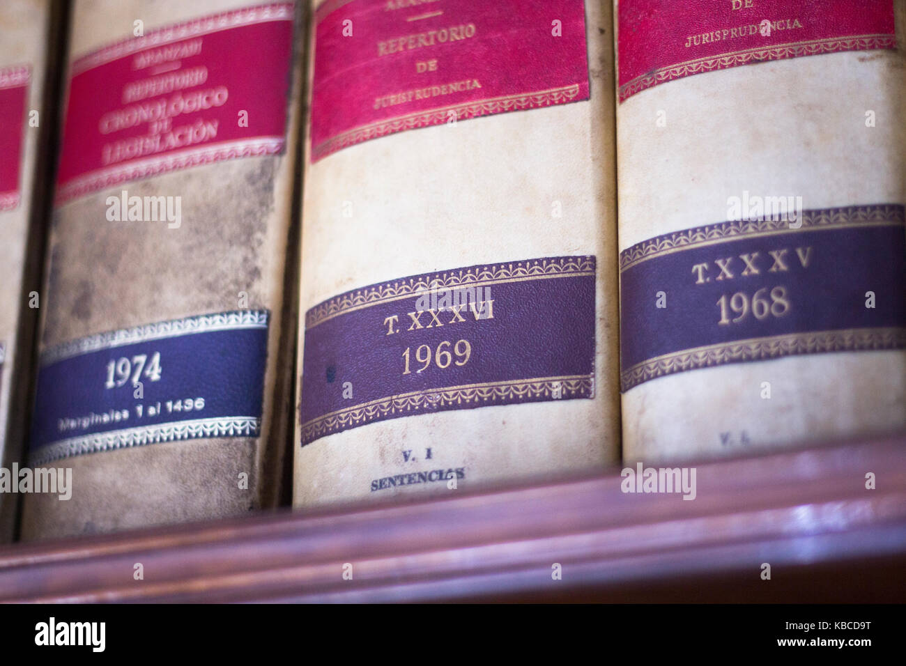 Old legal books law reports on shelves of law offices of attorneys and lawyers in judicial reference library. Stock Photo