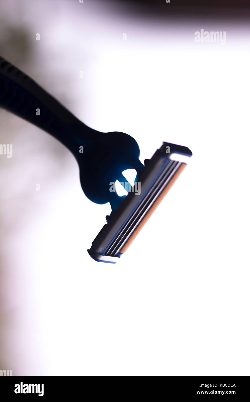 Modern safety disposable plastic shaving razor with multiple blades and