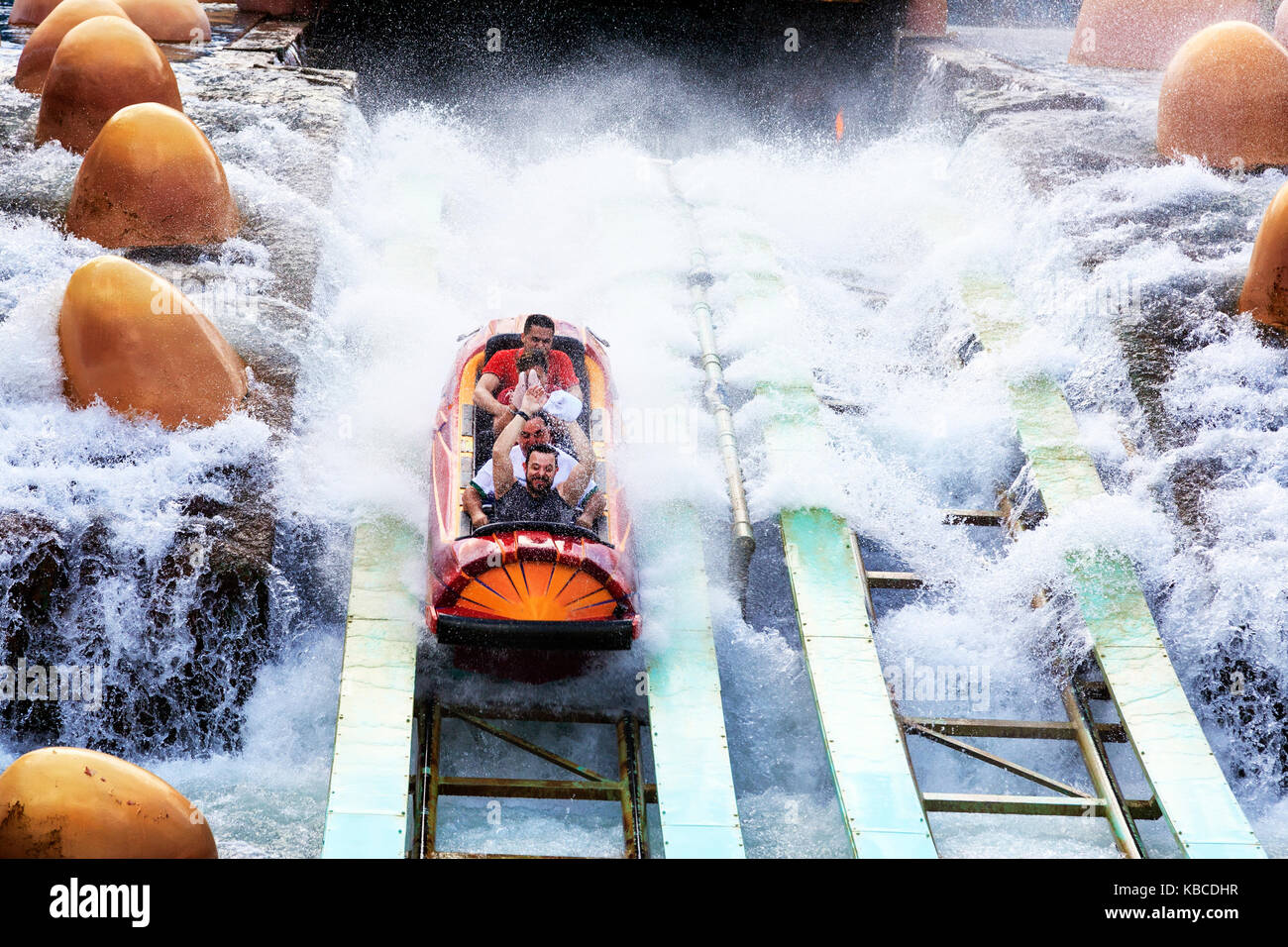Tourists enjoying the Splash Mountain theme park ride, Universal