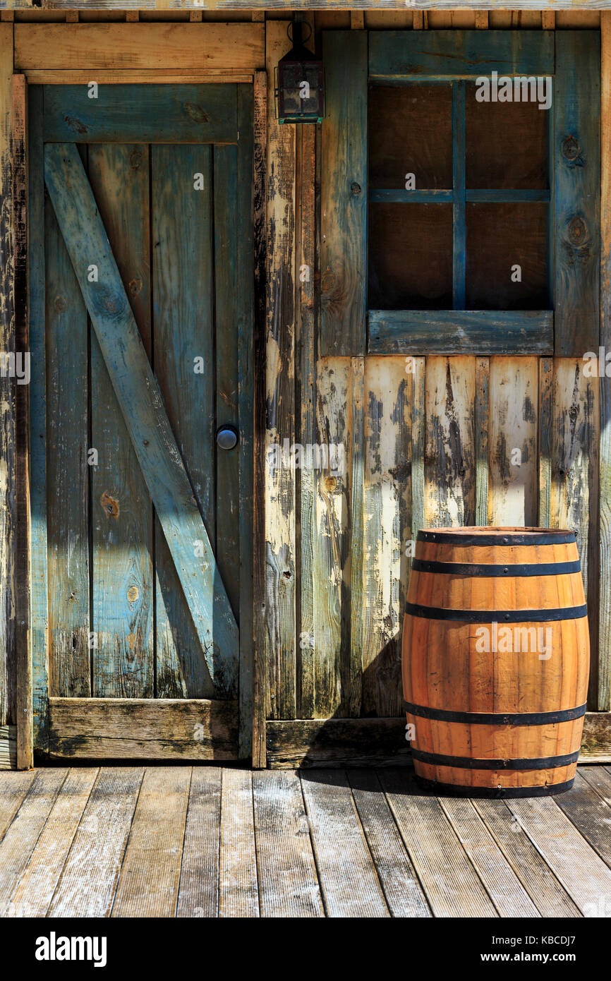 Wooden door, wooden window and wooden barrel, all weathered as part of