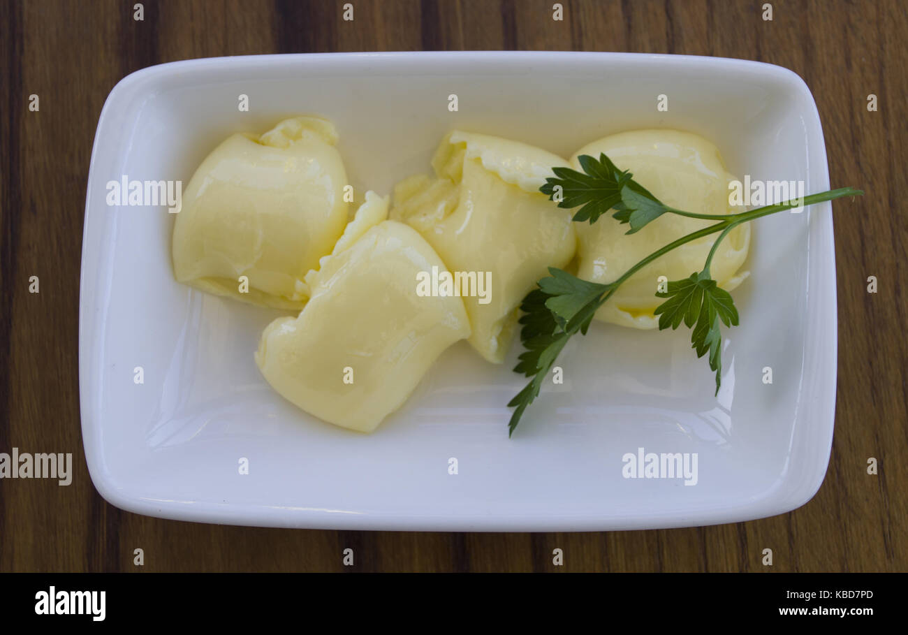 pat of fresh farm butter on a butter dish Stock Photo Alamy